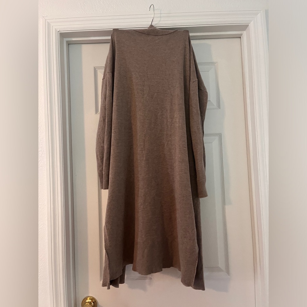 Knee length long sleeve cardigan. Size small.